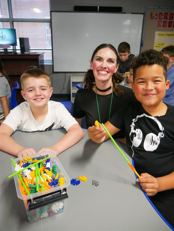 Students learning and having fun in Library.